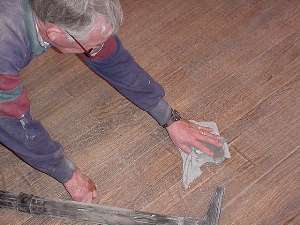 Wipe down sanded surface with tack rag