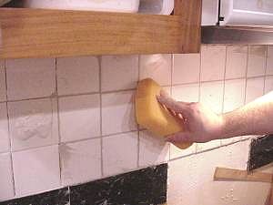 Sponge down to remove excess grout